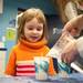 Five-year-old Maude makes an ice candle during one of many Hands-On Holidays: Hot vs. Cold exhibits Ann Arbor Hands-On Museum Jan. 5. 
Courtney Sacco I AnnArbor.com  